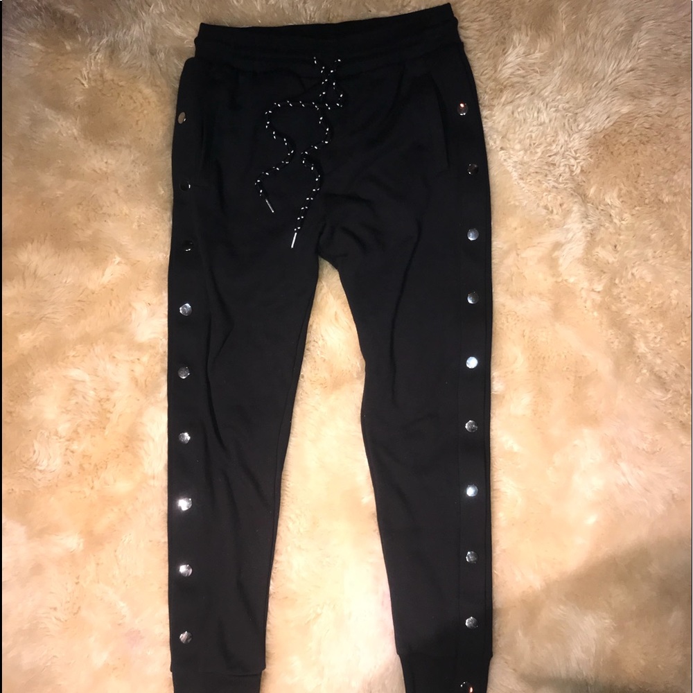 Rip away sweatpants black side snap closure